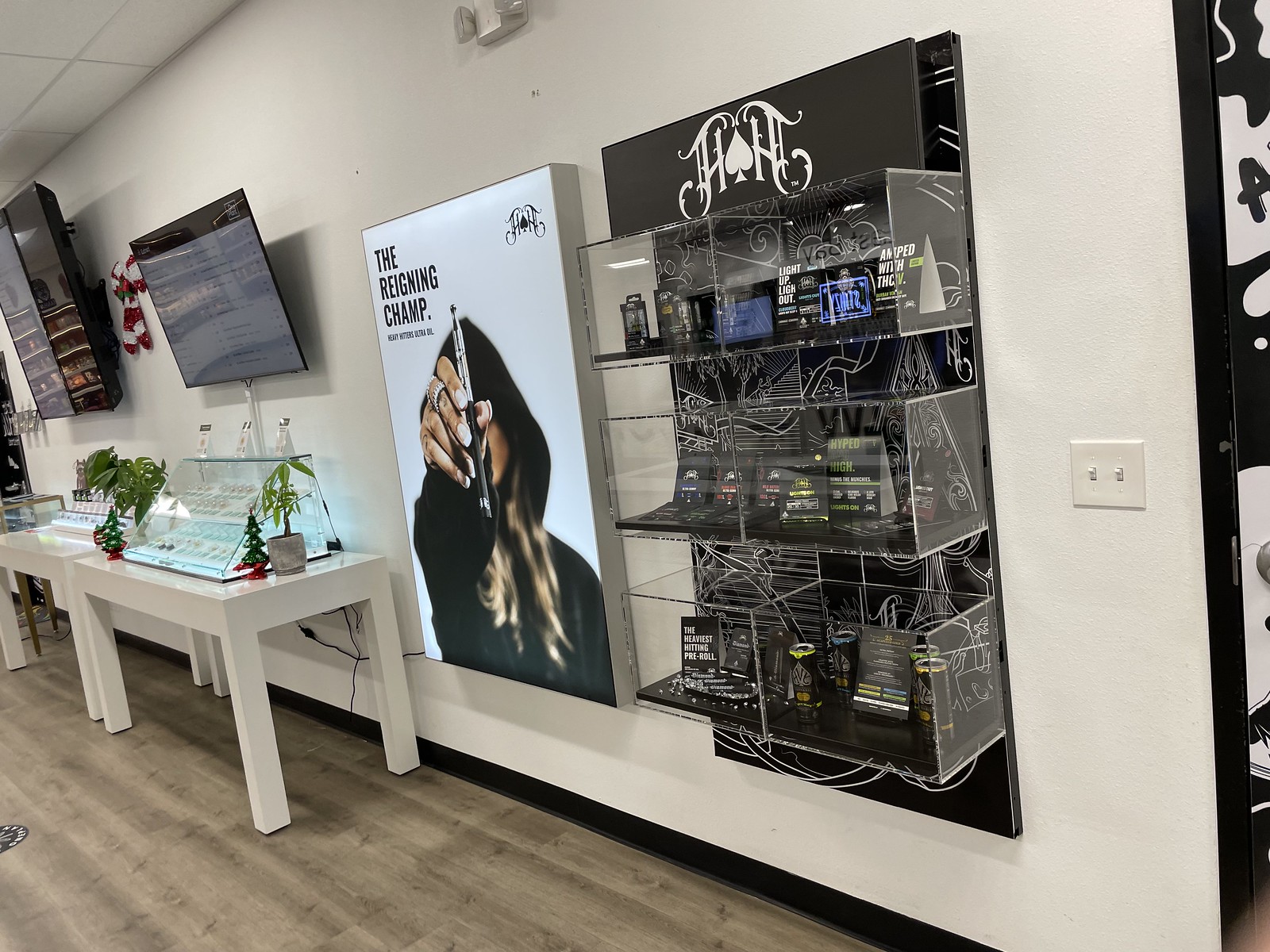 Heavy Hitters retail installation with illuminated signage and display cabinetry