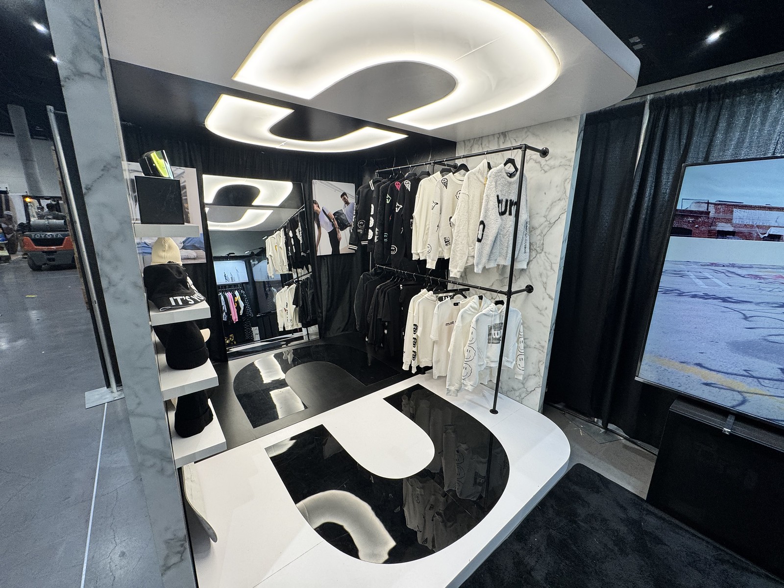 Custom Turn trade show booth with illuminated architectural details